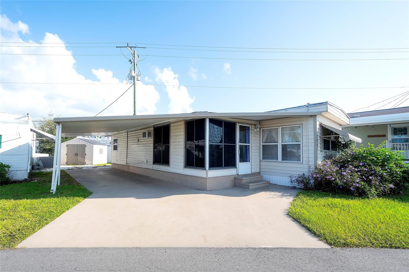 VALUE PRICED! This 2 bedrooms, 1.5 bath is efficient, convenient and priced to sell! Don’t be left out in the cold, winter will be here before you know it and you could be enjoying the Sarasota sunshine and easy lifestyle this home and this community has to offer. Added bonus is the Florida room, oversized outdoor shed and extended carpor. Home offered FULLY FURNISHED for convenience, so grab your bags and come on down to Sarasota, FL! . Mobile Estates is one of Sarasota’s hidden gems! RESIDENT OWNED community where your vote counts! OWN you own piece of Florida in this community. Where else can you enjoy the lifestyle, location and opportunities this home offers for such a price? A delightful blend of convenience and community living, making it an ideal spot for both seasonal visitors and year-round residents alike. Nestled in a prime location, less than 2 miles to Siesta Key. Mobile Estates provides easy access to the stunning beaches, area restaurants and walking distance to the charming Gulf Gate Village, known for its eclectic shops, restaurants, pubs and boutiques, all adding to the neighborhood's allure, offering residents a quaint and lively destination for shopping and entertainment. At Mobile Estates, residents experience the pinnacle of convenience with “share ownership” and currently the remarkably low HOA fee of only $215 per month, which covers essential amenities such as water, sewer and lawn maintenance. The community offers recreational facilities, including a newly refurbished pool (heated and chilled) with a heated spa, perfect for unwinding and socializing with neighbors. Bocce courts provide opportunities for friendly competition, while the recreation center serves as a hub for various activities and events, such as cards, games, food trucks, trivia nights, karaoke nights, and more, fostering a strong sense of camaraderie, fun and enjoyment among residents. This is a lifestyle you CAN AFFORD and enjoy.