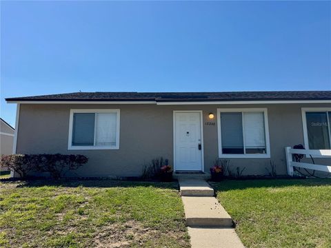 Photo of 12248 Tavares Ridge Circle, Tavares, FL 32778 (MLS # O6392617)