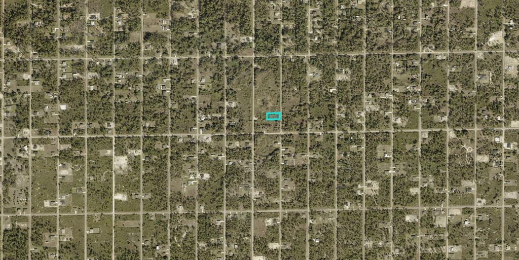 Photo of 1405 Magnolia Avenue, Lehigh Acres, FL 33972 (MLS # A4692370)