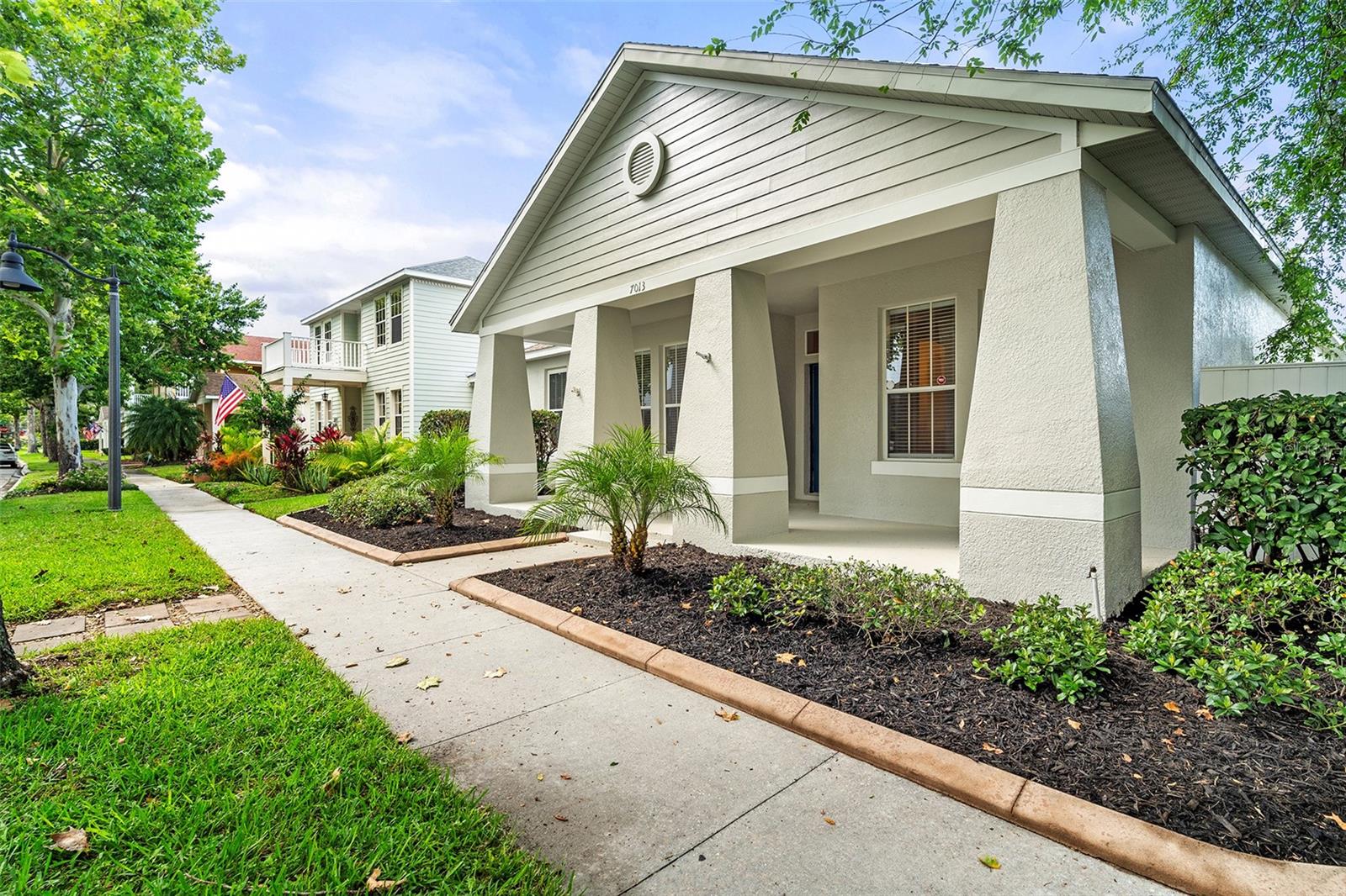 Welcome to this beautifully upgraded 3 bedroom, 2 bath home with a 2 car garage, ideally located on a picturesque tree lined street just minutes from the park. Working on a new roof! Recently painted outside and inside. New stucco, new roof and HVAC. Step inside to discover stylish plank flooring, 42" kitchen cabinets with crown molding, upgraded tile, and elegant marble countertops with dual sinks in the owner's suite. The luxurious primary bathroom features a relaxing garden tub, perfect for unwinding after a long day. The open-concept kitchen is a chef’s delight, offering stainless steel appliances, recessed lighting, a spacious closet pantry, and a breakfast bar that seamlessly flows into the inviting living room—ideal for gatherings and entertaining. New Dishwasher (2025). Step out to the screened-in lanai and enjoy peaceful Florida living year-round. Located in the desirable community of Harmony, residents enjoy access to top-rated schools and incredible amenities including Buck Lake with community boats and a fishing pier, scenic rocking chairs and bench swings, miles of walking trails, dog parks, playgrounds, a fitness center, two sparkling pools, and more. Don’t miss your chance to call this move-in ready home yours—schedule your private showing today!