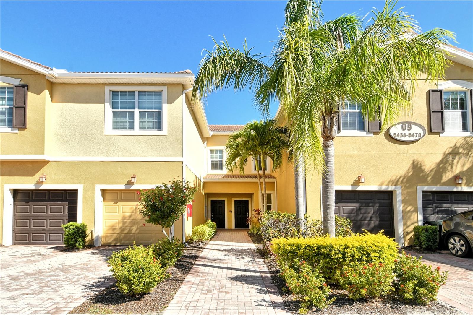 Nestled within a secure gated community, this 3beds 2,5 bath townhouse boasts an array of luxurious features and thoughtful design. The home offers a bright and open floor plan that lives large with versatile spaces. The first floor includes a private den, a spacious great room seamlessly connected to the dining area, and a stunning open kitchen. The kitchen is a chef’s delight, featuring rich cherry-stained wood cabinets, gleaming granite countertops, a brand-new electric range, stainless steel appliances, and a cozy eat-in alcove. A half bath on the first floor adds convenience.
Upstairs, you'll find three generously sized bedrooms, two full baths, and a flexible bonus room that can serve as an additional living area, office, or playroom. The home extends outdoors with a private lanai overlooking a serene green space, perfect for relaxing or entertaining.
Residents enjoy access to a heated community pool and beautifully maintained surroundings. Located just minutes from the world-renowned Siesta Key beaches, this home is in a prime location with top-rated schools nearby, including Ashton Elementary, Sarasota Middle, Riverview High, and Pine View School. Everyday conveniences, parks, and the 14-mile Legacy Bike Trail are all within easy reach, with quick access to I-75. This is a rare opportunity to enjoy luxurious, low-maintenance living in one of Sarasota's most desirable areas!