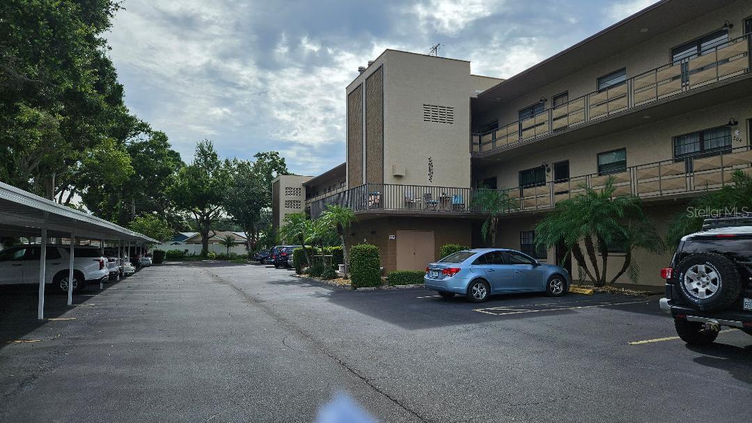 WELCOME TO THIS BEAUTIFUL FIRST FLOOR UNIT. IT IS BRIGHT, LIGHT AND OPEN.BEAUTIFUL NEWER LUXURY VINYL FLOORING. THERE ARE 2 FULL BATHROOMS WITH ONE WALK IN SHOWER AND ONE WITH BATHTUB. THE KITCHEN HAS GRANITE COUNTERTOPS AND STAINLESS-STEEL APPLIANCES. BEAUTIFUL GAS STOVE, THE GAS FOR COOKING, HEATING AND HOT WATER IS INCLUDED IN YOUR HOA. ALONG WITH THE CABLE, INTERNET, FLOOD INSURANCE, BUILDING INSURANCE, WATER, SEWER, GARBAGE. IT IS A SPLIT BEDROOM PLAN AND IS SO CONVIENEINT WHEN GUEST VISIT OR SET UP THE SECOND BEDROOM AS AN OFFICE. THERE IS A SCREENED BALCONY THAT LOOKS OUT ON BEAUTIFUL GROUNDS, THE COMPLEX HAS 6 POOLS,4 ARE HEATED IN THE WINTERTIME. THE UNIT ALSO COMES WITH A CARPORT. CALL TODAY FOR YOUR PRIVATE SHOWING.