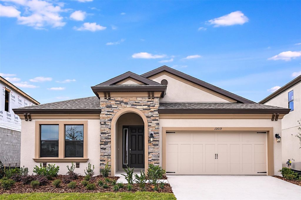 Photo of 14748 Summer Branch Dr, Lithia, FL 33547 (MLS # J988260)