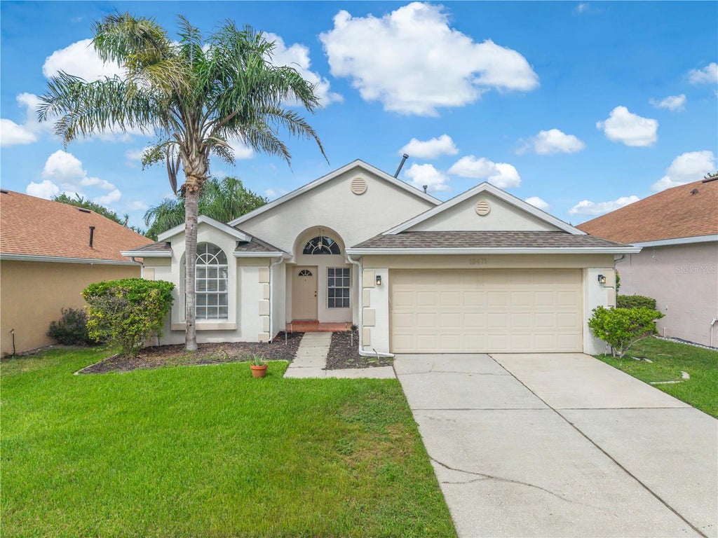 Photo of 12471 Castlemain Trail, Orlando, FL 32828 (MLS # O6452168)