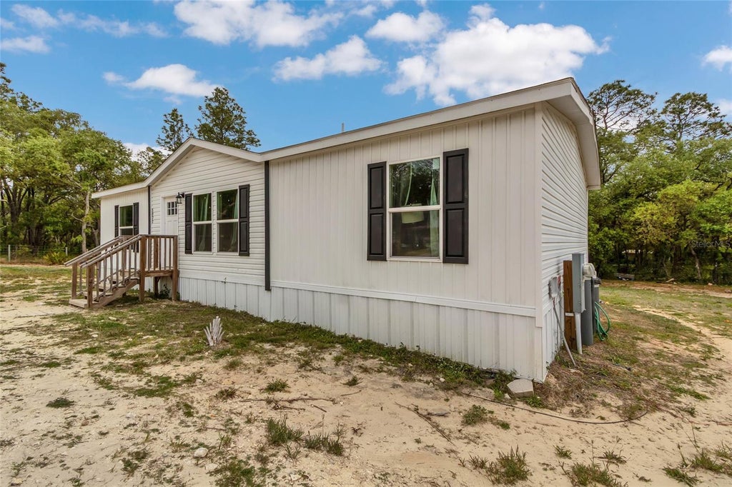 Photo of 5021 S Adventure Point, Homosassa Springs, FL 34446 (MLS # W7888841)