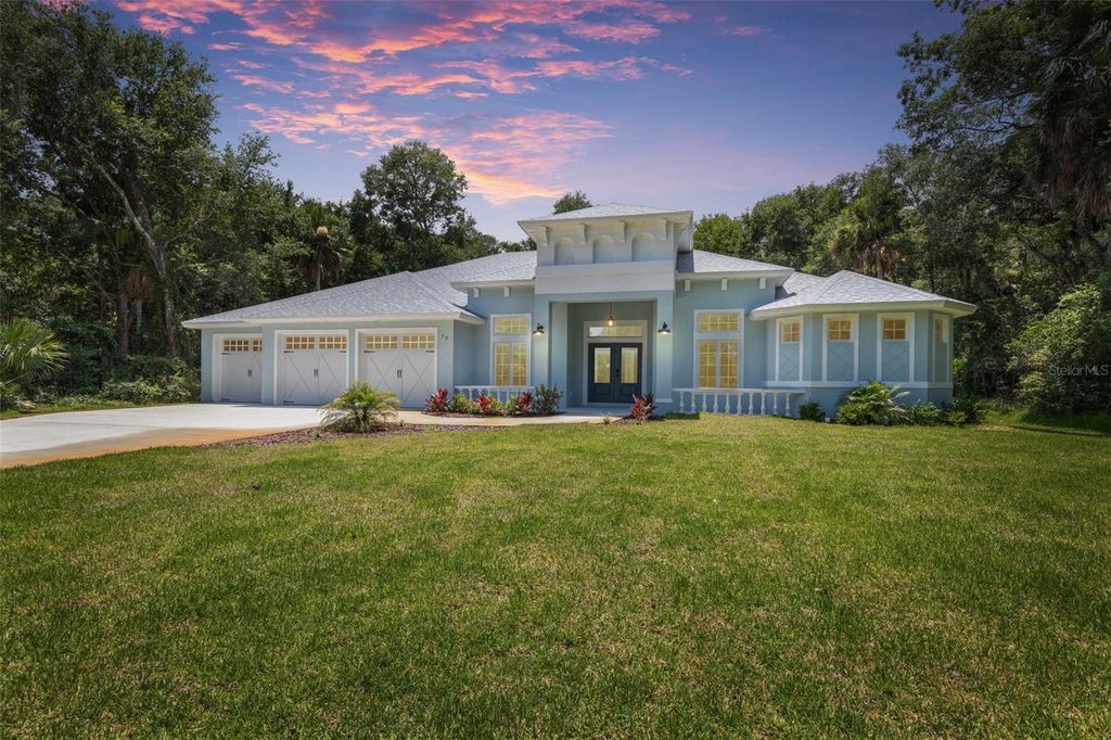 Photo of 73 Bridle Ridge Court, Flagler Beach, FL 32136 (MLS # FC319694)