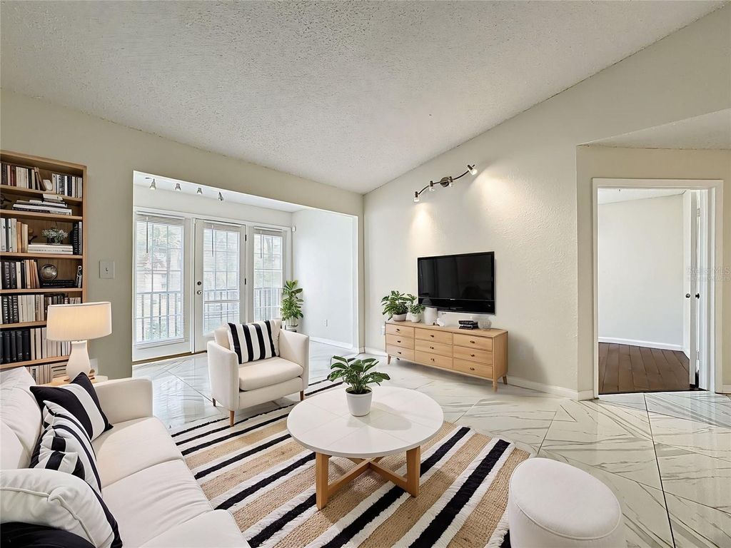 Photo of 232 Afton Square #201, Altamonte Springs, FL 32714 (MLS # O6371076)