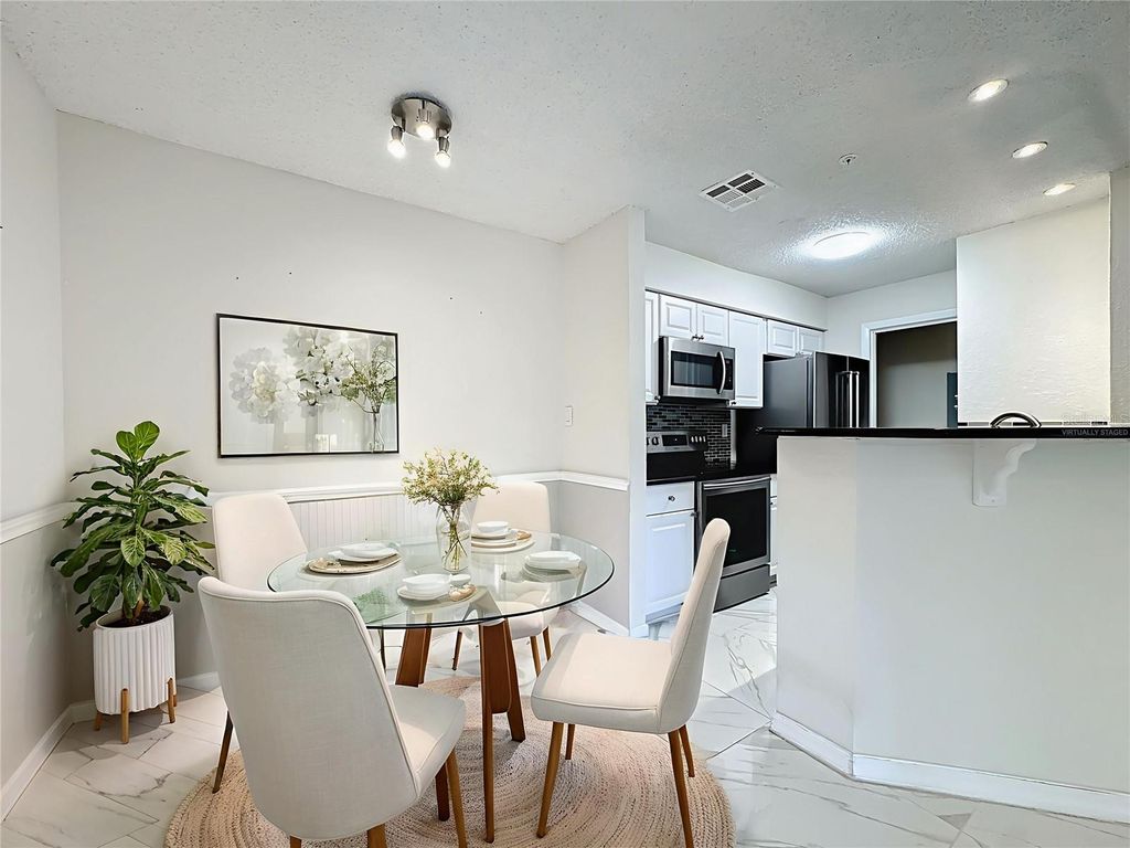 Photo of 232 Afton Square #201, Altamonte Springs, FL 32714 (MLS # O6371076)