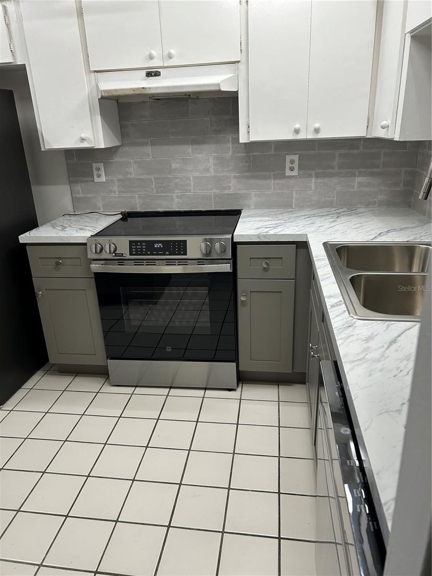 Welcome to Maintenance Free living in the quiet, relaxing enclave of Gardens of Beacon Square. You enter your new home with a covered,  Spanish style tiled portico. Recently renovated and updated, freshly painted with new floors and appliances, this 2 bedroom 2 bath condo located in the  gated 55+ neighborhood at The Gardens at Beacon Square. Bring your fishing gear as you are close to the Gulf of America and don't forget your golf clubs to use at the many public courses located nearby.  Close to shopping in downtown New Port Richey, not far from Tarpon Springs, beaches and Tampa Airport only 45 minute drive! Come see it today!