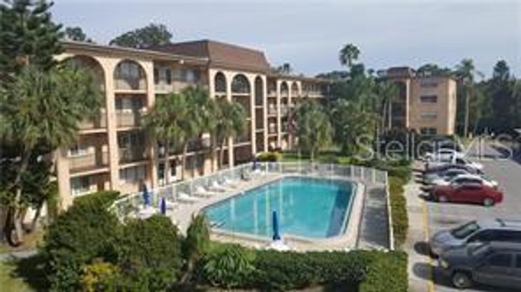 Photo of 2525 W Bay Drive #C12, Belleair Bluffs, FL 33770 (MLS # TB8457981)