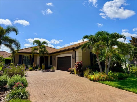 Photo of 2436 Arugula Drive, North Port, FL 34289 (MLS # C7530117)