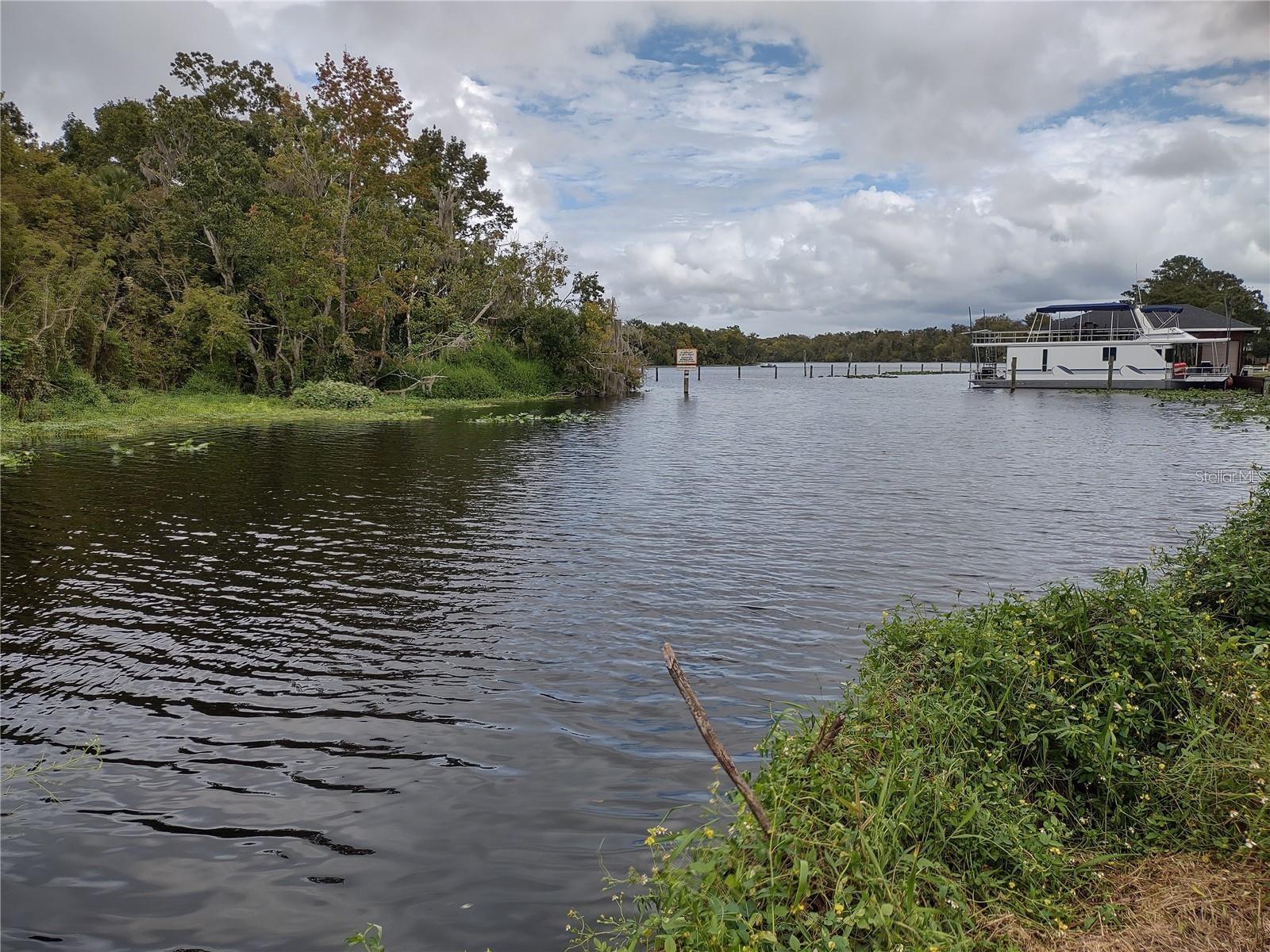 RARE!
Almost 1 acre of waterfront property on St Johns River!
Spectacular views and immediate access to the intercoastal waterway.
Plenty of land to build your dream home. Improve the docks to a boathouse or better dockage.
2 docks that have been there since the 1970's would require renovation.
The existing 2/1 home is old and would need compete renovation at a minimum.
The peninsula type shape of the lot lends itself to becoming a private compound.
Neighborhood boat landing only a block away.
A private beach is on the property. It's a bit overgrown at this point and would need to be cleared - could be a boat landing.
2 parcels - multiple new structures would be permitted.
Utilities are already there on both parcels.
Impacts already paid.
Grandfather permit advantages.
Public water and sewer
Private! Quiet country waterfront living with spectacular views!
Perfect to build a dream home!