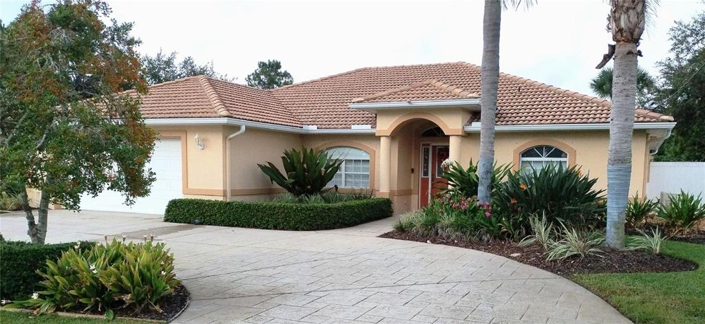 Photo of 110 Burroughs Drive, Palm Coast, FL 32137 (MLS # O6351536)