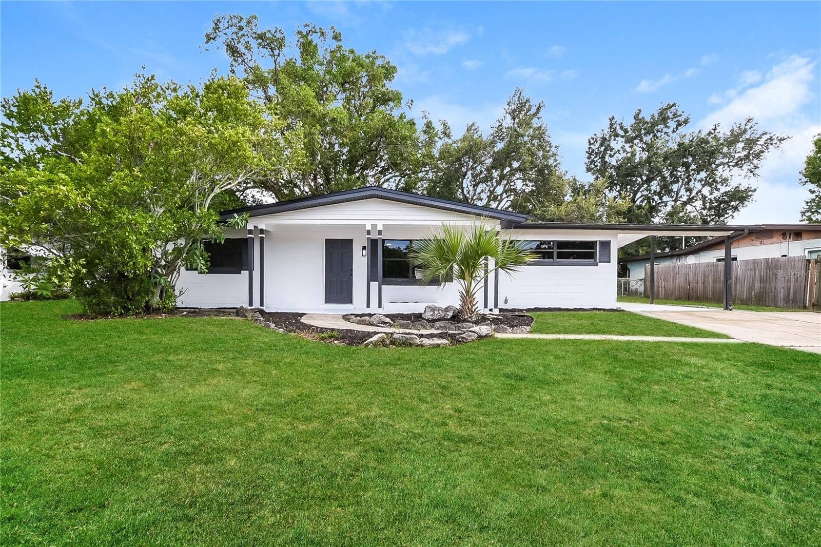 This fully updated 3-bedroom, 2-bath home features fresh exterior and interior paint, new LVP flooring, carpet, and bathroom refresh. The kitchen boasts new cabinets, quartz counters, and a stainless steel appliance package including range and dishwasher. Recent upgrades include new roof, HVAC, and electrical panel, making this home move-in ready and worry-free.