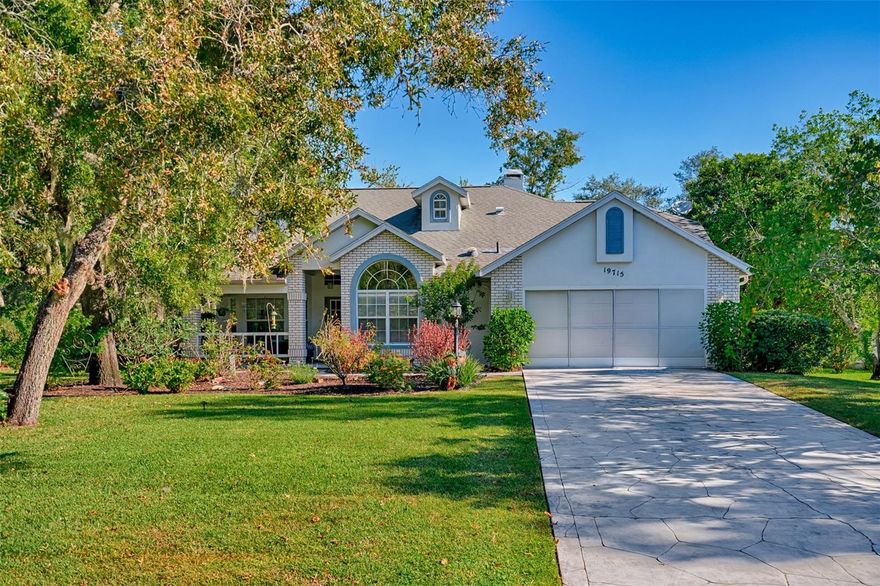 This is an amazing neighborhood with access to one of Florida's prettiest rivers, The Rainbow River!  You will love this pool home on a half-acre corner lot with gorgeous live oaks.  You walk up to a beautifully shaded front porch to enjoy the cooler days we are starting to have. As you enter you will find a well-cared for home with a large dining room on your left that looks into the family room.  The big family room has natural light from a solar tube along with a wood burning fireplace that opens to the Florida room in back and the kitchen towards the front.  The kitchen has ample counter space including an island for even more space for buffets and storage with great natural light from the front windows.  The breakfast area overlooks the beautifully landscaped front yard that makes for a peaceful breakfast every morning.  Off the kitchen is the laundry room that leads to the garage with another solar tube that makes doing laundry as easy as it can be.  There are wood floors throughout these living spaces. Heading back to the Florida Room, this could be a great place to spend a lot of time that overlooks the pool and huge back yard. The main bedroom will hold your king size bed, end tables and dressers so you will have everything you need!  With large walk in shower, soaking tub, dual vanities, and big walk in closet, you will enjoy the space this bathroom has for you.  Two good sized bedrooms, one with a walk-in closet, for family and guests with hall bath will make them feel right at home.  Going outside to the pool area that you will enjoy all summer long for cookouts with family and friends.  A great seating area is offset from the pool for your table and chairs along with your grilling area.  The backyard is a great size for your garden and where kids can play.  Community is fantastic with pool, pickle ball courts, gym, game room and meeting room.  There is also a restaurant to enjoy close to home as well. The access mentioned to the Rainbow River is fantastic!  Bring your canoe, kayak, paddle board and fishing pole and go have a great time.  There are a few stairs down to a walk in area to make launching your water craft very easy. Covered pavilion with picnic tables to take a break for lunch is sure to please. The Rainbow River feeds into the Withlacoochee River that goes into the reservoir of Lake Rousseau.  All of these water ways have great boating and fishing.  Enjoy Swampy's Restaurant on The Rainbow River and The Blue Gator at the Dunnellon bridge on the Withlacoochee River.  Very unique neighborhood with the community center amenities and access to the gorgeous Rainbow River!