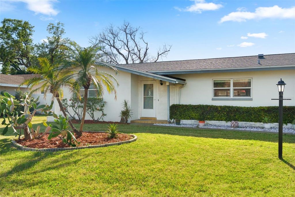 Photo of 1768 Harbor Circle E, Largo, FL 33770 (MLS # TB8494574)