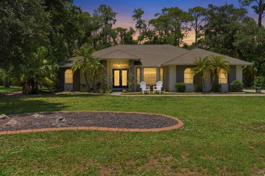 Rarely does an opportunity arise to own one of the most expansive and private estates in the coveted Mill Creek community.  This exceptional home spans nearly an acre and a half of lush land, offering a level of tranquility and space that is increasingly hard to find.  Situated in a preferred X flood zone (no insurance required), the massive lot is a true sanctuary, bordering no neighbors directly in the front or rear and sitting just across from a serene, rarely-used private park.  The home itself carries a legacy of care and thoughtful design, featuring three spacious bedrooms and two and a half beautifully renovated bathrooms.  The interior radiates elegance with soaring vaulted ceilings, while the floor plan emphasizes convenience with generous walk-in closets in every single bedroom.  outdoor kitchen that features a built-in grill, sink with hot and cold water and refrigerator is ready for all your pool and backyard entertaining. The kitchen has custom granite countertops with cabinets, a breakfast bar and pantry. The floors boast either new laminate flooring or tile for easy maintenance and clean up. The spacious Master bedroom has French doors leading to the patio and pool area, new laminate floors, separate his and her walk-in closets that lead to the Master Bathroom. The Master Bathroom features a new stylish, stand-alone soaking tub, separate shower and dual sinks. Cathedral ceilings and pocket doors help make this home feel spacious. The 2nd and 3rd bedrooms feature large walk-in closets and new laminate floors. New stainless kitchen appliances and tankless hot water heater.  A standout feature of the property is the large enclosed garage, which provides not only secure parking but also tons of storage for all your work or organizational needs.  The vast acreage ensures that the potential here is truly limitless.  Whether you envision a massive, detached RV garage, a professional-grade workshop, or secondary utility structures to protect your toys from the elements, there is more than enough room here to build your dreams.   Entertaining is effortless on this estate, which features a sprawling driveway capable of accommodating up to 24 vehicles for gatherings.  The outdoor living space is highlighted by an inviting martini pool and a dedicated grill area, perfect for hosting weekend parties or enjoying quiet Florida evenings in the shade of nature.  Despite the immense size and privacy of the lot, the property remains governed by low HOA fees and no CDD ensuring the neighborhood's beauty is preserved without high overhead.  Beyond the property lines, Mill Creek offers a lifestyle of unparalleled convenience and A rated schools.  You are positioned within easy reach of the world-renowned Beaches of Anna Maria Island and Siesta Key, while the nearby Lakewood Ranch Main Street and University Town Center provide premier shopping and dining.  With swift access to I-75 and the Sarasota-Bradenton International Airport, commuting to Tampa or St. Pete is a breeze.  This is more than just a house; it is a sprawling canvas ready for its next chapter.  Schedule your private tour today to experience the scale and serenity of Mill Creek’s finest.  Professional Photos coming soon.