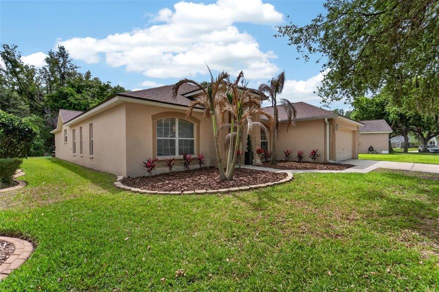 A SOLAR-HEATED POOL IN A FRESHLY RESURFACED AND SCREENED LANAI, along a cul-de-sac with a wooded backdrop instead of another neighbor, will get your attention first at this home in FishHawk's Shearwater enclave! But don't overlook all the other attractive qualities here -- including brand-new luxury vinyl plank and carpet alongside tile floors, a dimensional-shingle roof installed with the solar panels just 6 years ago, as well as customizations from a stone fireplace to granite counters and from cabinet / shelving buildouts in 2 rooms to a French-doored den or office in front. This 2,350-SF Cardel Sandhill design also has been modified to open the 4th bedroom into a play space in the back corner between the secondary beds and bath. The owner's suite in the opposite corner features a pool view as well as a glass-tiled shower in its dual-sink bathroom with separate tub and walk-in closet. The large kitchen includes a center island, staggered wood cabinets, and a front cafe space apart from the main dining room. Other improvements include a variable-speed pool pump and new garage door opener both with wifi app features. The best reason to buy, of course, is this location in fabulous FishHawk with Bevis Elementary and other top-rated schools, Park Square plus other shops and restaurants, recreation options from sports facilities to walking trails to the resort-style aquatic complex and more. Make your appointment to see this home today!