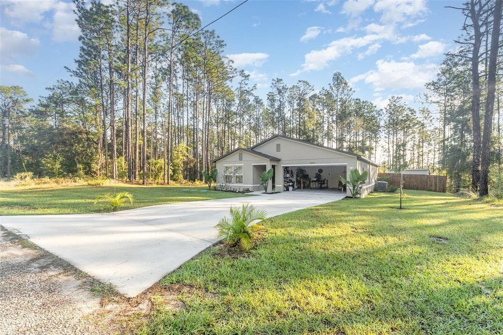 Photo of 7065 N Heritage Drive, Dunnellon, FL 34434 (MLS # TB8440529)