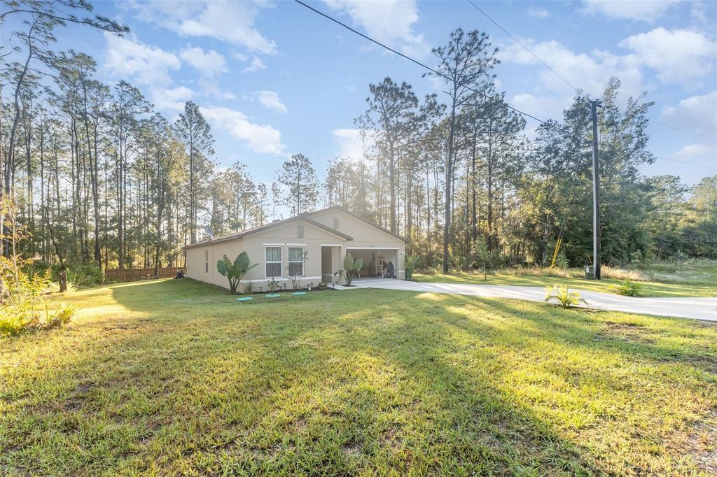 Photo of 7065 N Heritage Drive, Dunnellon, FL 34434 (MLS # TB8440529)