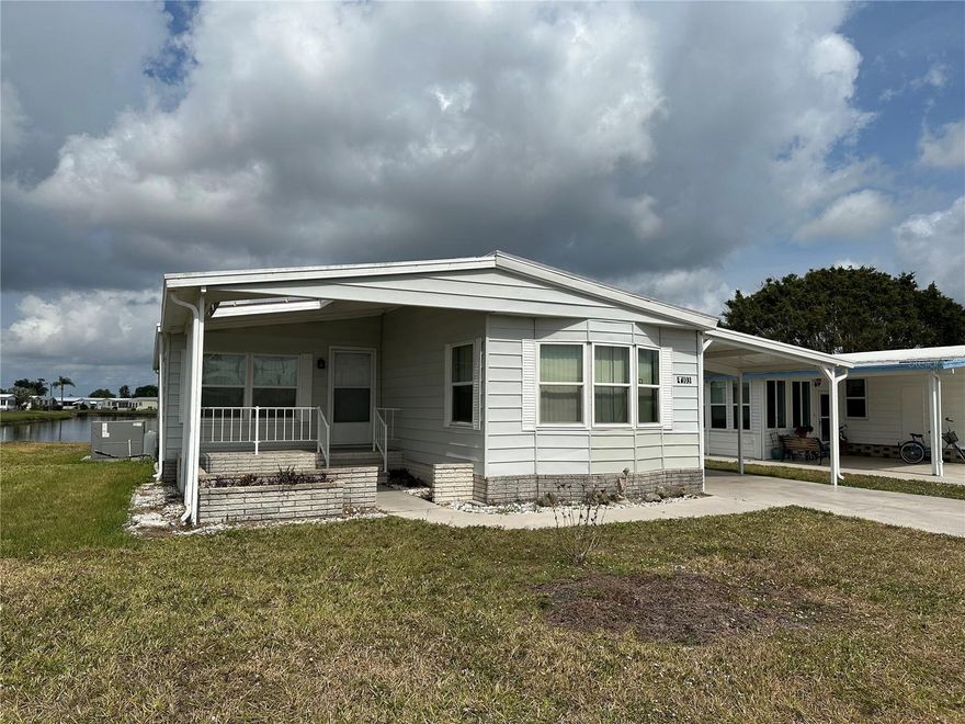 Welcome to 103 Lake View Drive, a bright and welcoming home located in the secure, gated 55+ community of Harbor Isles in North Port. This well-maintained 2-bedroom, 2-bathroom residence offers comfortable living with a layout designed for both relaxation and functionality. Whether you're looking for a full-time Florida retreat or a seasonal escape, this home is ready for you to move in and enjoy.

Step inside to find a spacious open living area filled with natural light and complemented by neutral finishes. The kitchen features ample cabinetry, a breakfast bar for casual dining, and direct access to the dining and living areas, making entertaining a breeze. A large enclosed Florida room adds additional year-round living space, perfect for morning coffee, quiet reading, or hosting guests.

The primary bedroom offers an en-suite bath and generous closet space, while the guest bedroom and second full bath provide a comfortable setup for visitors. Outside, the property includes a covered carport and attached utility shed, ideal for extra storage or hobby space.

Residents of Harbor Isles enjoy access to a wealth of amenities including a clubhouse, heated pool, fitness center, tennis, pickleball, and boating access to the Myakka River and Gulf. With close proximity to Gulf beaches, shopping, and dining, 103 Lake View Drive offers a wonderful opportunity to embrace the Florida lifestyle in a friendly and active community.