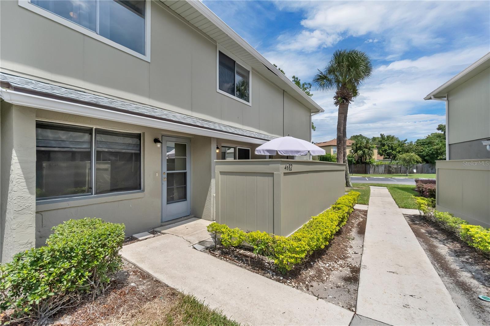 Welcome home to this cozy two-story condo! This charming unit features two bedrooms and a full bathroom upstairs, with a convenient half bathroom on the main floor. The first level also includes a comfortable living room, laundry closet, kitchen/dining area, and access to the porch and shared garage. The unit includes one dedicated parking space in the shared garage and a large private storage closet. Conveniently located minutes from Orlando International Airport and close to major attractions, shopping, and dining. This is a great place to call home!
