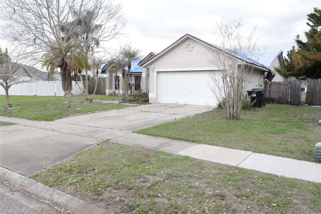 Photo of 11346 Cypress Leaf Dr. Drive, Orlando, FL 32825 (MLS # O6389698)