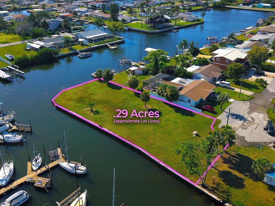 This is a rare opportunity to own a prime piece of vacant land in Hudson Beach, perfect for building your dream home. Enjoy the luxury of direct Gulf access just minutes away, offering endless boating and fishing adventures. With ample space on the west side of the property, you have the unique ability to install multiple docks, accommodating all your watercraft. Imagine waking up to stunning water views and living the quintessential Florida waterfront lifestyle.