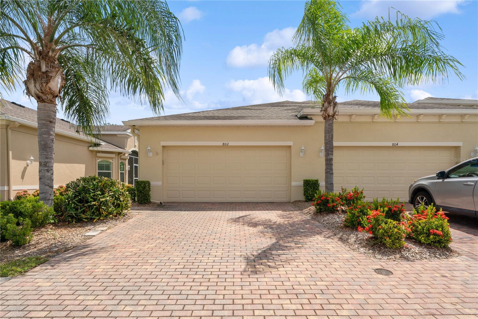 Discover luxury resort-style living in the highly desirable gated Verona community of Sun City Center. This popular Buttonwood villa, built in 2016, blends elegant finishes and thoughtful upgrades across 1,568 sq?ft of single-level living space on a beautifully landscaped lot.
Step inside to find a bright, open floor plan with tray ceilings, crown molding, and built-in shelving, complemented by plantation shutters throughout. The gourmet kitchen delights with granite countertops, center island with breakfast bar, ample cabinet storage, and upgraded lighting—perfect for both casual meals and entertaining. Host gatherings effortlessly with a split-bedroom layout offering privacy for guests. The spacious interior includes ceiling fans, walk-in closets, and an inside laundry room with full-size washer and dryer. Relax in the screened rear lanai overlooking serene golf-course and water views—enjoy breezy afternoons surrounded by a pond and majestic oak trees. Located just minutes from Tampa Bay, Sarasota, and St. Pete, this is the ideal 55+ lifestyle of leisure, convenience, and community. All this in an elegant, move-in ready setting—schedule your private showing today!
Relax in the screened rear lanai overlooking serene golf-course and water views—enjoy breezy afternoons surrounded by a pond and majestic oak trees.