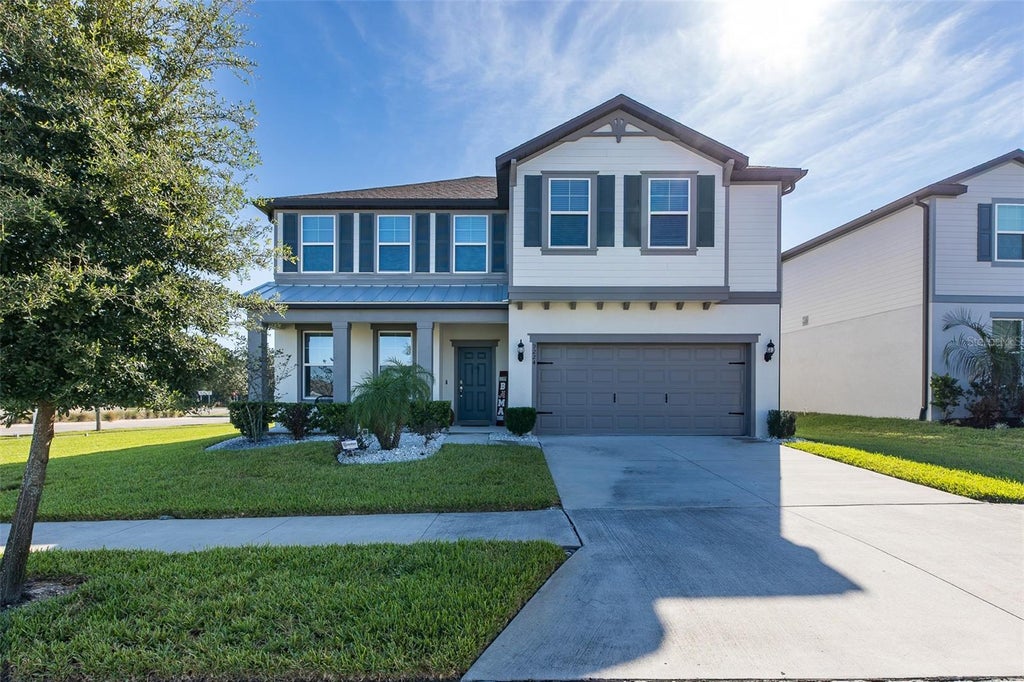 Photo of 9224 Rally Spring Loop, Wesley Chapel, FL 33545 (MLS # W7889753)