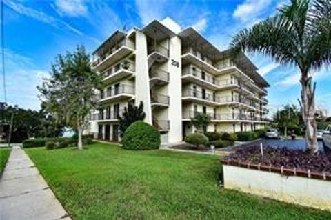 Photo of 208 Lake Howard Drive NW #104, Winter Haven, FL 33880 (MLS # P4935096)