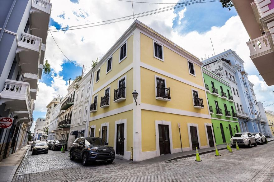 Located in Old San Juan, this three-story building represents an excellent investment opportunity. With a total of 6,700 square feet, it combines established income with great potential for growth. It is a turn-key property, ready to continue generating profitability.

The ground floor features a spacious and versatile commercial area that the buyer can adapt to their own vision. This level offers multiple possibilities for use, whether as a restaurant, boutique, gallery, warehouse, or VIP area for private events.

The residential units are located on the upper floors. The first apartment is a studio with one bedroom and one bathroom, remodeled in a modern and cozy style, with ceramic tiles, kitchen appliances, and fully furnished. The second apartment is larger, with two bedrooms and one bathroom, also furnished and equipped with appliances. It also includes a balcony, perfect for enjoying the vibrant nightlife. On the third floor is the penthouse, featuring three bedrooms, two bathrooms, and a comfortable layout. It is spacious, fully furnished, and equipped with appliances and A/C units.

This property offers a rare and unique combination that is hard to find in Old San Juan, Puerto Rico — and it’s ready for you.