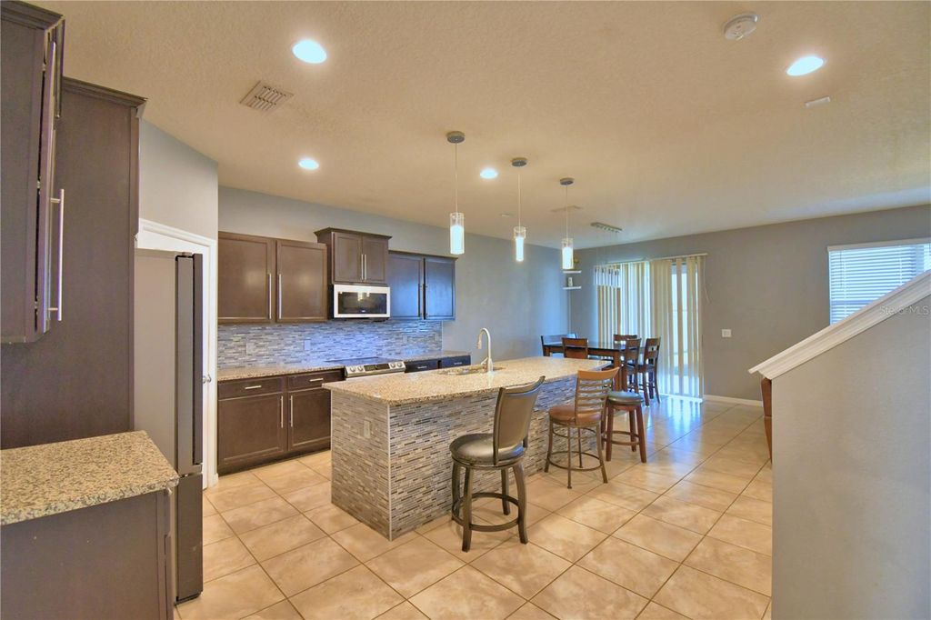 Photo of 8659 Rindge Road, Polk City, FL 33868 (MLS # S5138161)