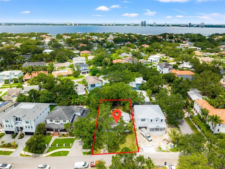 Build Your Dream Home on Tampa’s Most Coveted Island Nestled in the heart of exclusive Davis Islands, this rare oversized lot (73’ x 133’) offers a one-of-a-kind opportunity to create a stately custom residence with all the luxuries of island living. Spanning a lot and a half, the generous dimensions provide the perfect canvas for a grand home, resort-style pool, and still leave room for a lush backyard—an uncommon find in South Tampa. Set on a quiet, tree-lined street just moments from the Davis Islands Yacht Club and private airport, the property is flanked by two contemporary elevated homes valued at over $3M, enhancing the prestige and investment potential. Whether you're envisioning a sleek modern masterpiece or a timeless coastal estate, the scale and setting of this lot make it possible. Davis Islands is beloved for its laid-back island charm and close-knit community, all just minutes from Bayshore Boulevard and Downtown Tampa. Cruise around by golf cart and enjoy effortless access to local favorites like DI Coffee Bar, neighborhood dining, boutique shopping, and everyday essentials—without ever leaving the island. And with Tampa General Hospital, one of the nation’s top trauma centers, right at the island’s entrance, peace of mind is part of the package. A rare chance to build among the stars on Tampa’s "celebrity island"—this is more than a lot...it's a lifestyle.