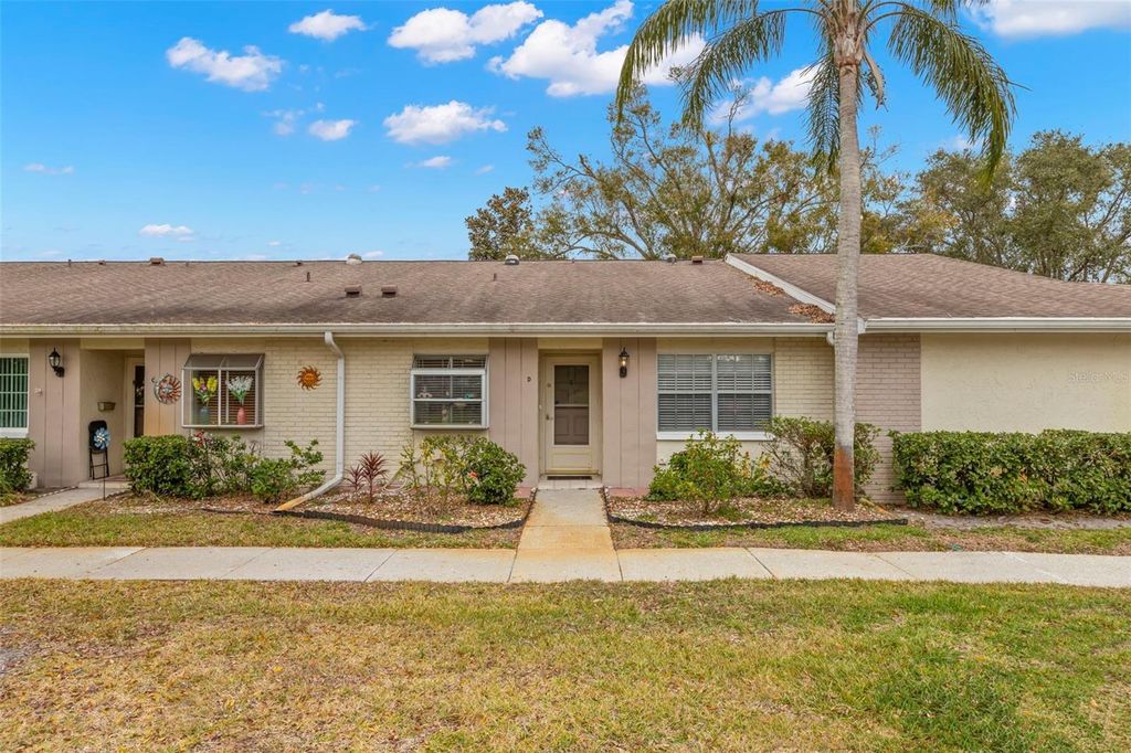 Photo of 1084 Dunrobin Drive #D, Palm Harbor, FL 34684 (MLS # TB8466777)