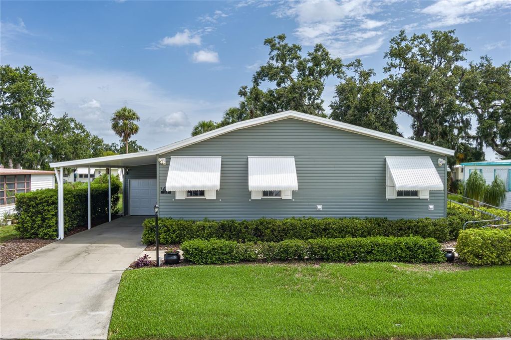 Photo of 6710 36th Avenue E #114, Palmetto, FL 34221 (MLS # A4656004)