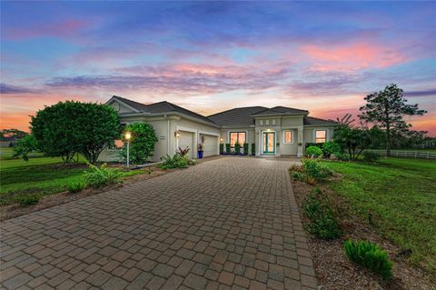 Photo of 16976 Painted Post Lane, Sarasota, FL 34240 (MLS # A4664784)