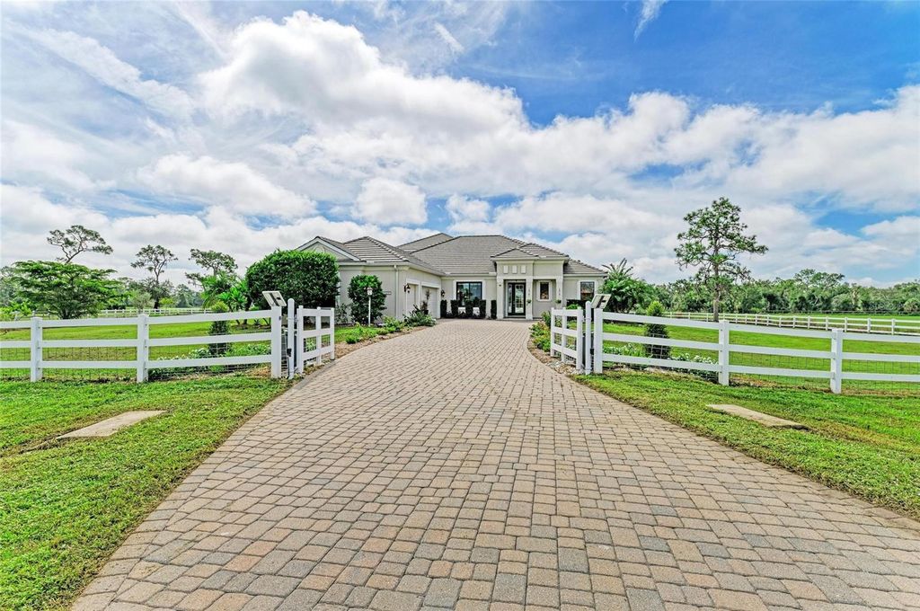 Photo of 16976 Painted Post Lane, Sarasota, FL 34240 (MLS # A4664784)