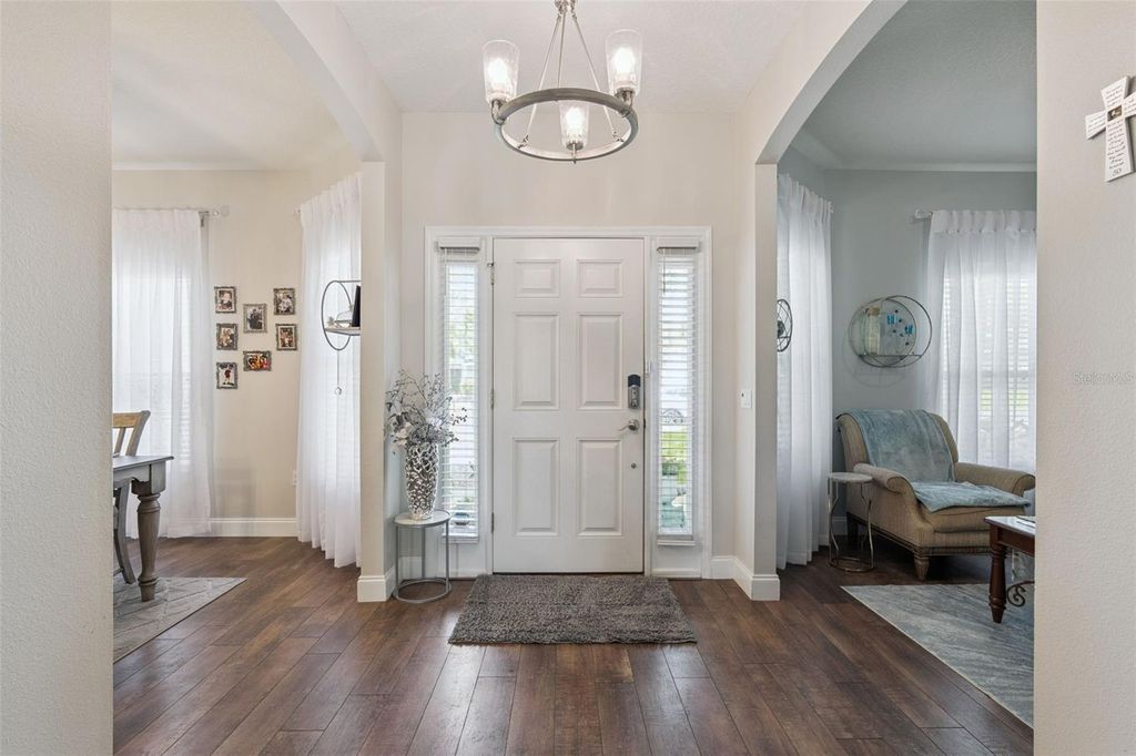 Photo of 703 Cypress Oak Circle, Deland, FL 32720 (MLS # O6396396)