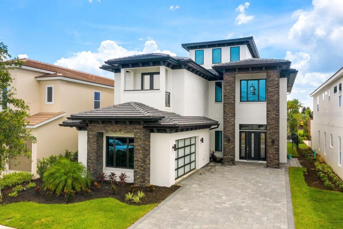 This Triple Deck delight is one of the very few true CUSTOM BUILT homes to grace one of Reunion's most sought after addresses- The Bear's Den. Enjoy one of the best outlooks in Reunion from the third-floor deck which can even provide a view to the DISNEY FIREWORKS! Each level of this home was built to ENTERTAIN. Its lofty privacy includes a hot tub, TV screens, and plenty of seating. Another highlight of this home is its game room on the 3rd-floor landing with Playstation 4, Xbox, Fast and Furious Superbikes Race, San Francisco Rush 2049 cat racing machines, and shuffleboard. The home theater has plenty of cushioned seating before a large projector screen.
The first two floors contain 8 BEDROOMS that sleep up to 24 people! With an open planned floor plan, the living area is bright and spacious with a large wrap-around sofa before a large wall-mounted TV. The stunning kitchen with stainless steel appliances and granite countertops includes an over-sized double-sink kitchen island. The island counter wraps around a built-in seating area with cushioned benches around a kitchen table. Around the corner you'll find a fine dining table that seats 18 - you're entire party!
This home includes two amazing THEMED BEDROOMS kids will love. Each room has two bunk beds (sleep 4) custom made to fit each theme. Whether kids love to zoom through faraway galaxies or live the life of a princess, they will be fully immersed. One upper bunk bed has a secret passage through a slide that takes kids to a secret playroom filled with soft foam blocks. Adults need not worry - alternative access is available! For playtime outdoors, there's a playground only a stonecast away, just behind the home.
All of the other bedrooms are King-size with one exception: a room for two with separate Queen-sized beds. All of the rooms have their own TVs and there is an additional gathering room with a large comfy wrap-around sofa before a wall-mounted big-screen TV.
The private pool has a spillover spa and the pool deck has plenty of sun loungers. A kids' safety fence is available. The lanai includes a summer kitchen with a BBQ grill. The patio dining table seat 16, and there are a few additional chairs scattered about. This home offers everyone in your family or group the comfort and entertainment that makes a stay in the Orlando area something to boast about. Reserve this beautiful property by booking it as early as possible and it can be part of your next vacation!