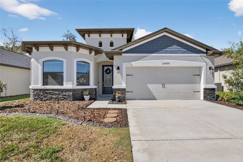 Photo of 11439 Crowne Pointe Street, New Port Richey, FL 34654 (MLS # TB8481108)