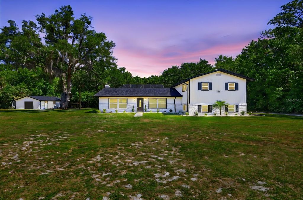 Photo of 155 E Country Circle Drive E, Port Orange, FL 32128 (MLS # V4948727)