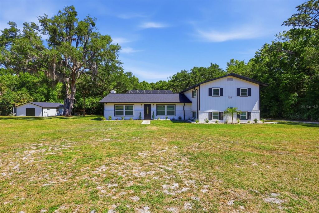 Photo of 155 E Country Circle Drive E, Port Orange, FL 32128 (MLS # V4948727)