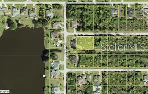 Double Lots in Port Charlotte, Florida – Your Slice of Paradise!** Welcome to Helios Avenue, where there are no deed restrictions, and no HOA! We present not one, but two adjacent lots at 11975 and 11983 Helios Ave. Whether you’re an investor, a builder, or someone dreaming of building their own custom home, these lots endless possibilities. Key Features: Prime Location: Nestled in the heart of Port Charlotte, these lots provide convenient access to shopping, dining, and recreational amenities. Size: Each lot spans approximately 10,000 square feet, giving you ample space to create your vision. Environmental Inspection: Rest easy knowing that both lots have undergone a clear environmental inspection; no gopher tortoises burrows present, not in a flood zone, no heritage oaks, and not in a Scrub Jay area! Silt Fencing: The thoughtful installation of silt fencing ensures soil erosion control and protects the environment. Utilities: Electricity and water available, making development straightforward. Imagine the Possibilities: Build Your DreamHome: Combine both lots for an expansive estate or build on one and sell the other. Investment Opportunity: Develop and hold for future appreciation or consider rental properties. Land Banking: Secure your piece of Florida real estate for generations to come. Location Highlights: Beaches: Just a short drive to pristine Gulf Coast beaches – perfect for sunsets and relaxation. Golf Courses: Tee off at nearby golf courses, including the popular Riverwood Golf Club. Parks and Recreation: Explore the natural beauty of the area at Ollie’s Pond Park or take a stroll along the Peace River Walkway. Boating and Fishing: Launch your boat at the Port Charlotte Beach Park and explore the waterways. Don’t miss this chance to own a double slice of Florida paradise. Contact the listing agent today for more information or feel free to do a drive-by, and turn your real estate dreams into reality!