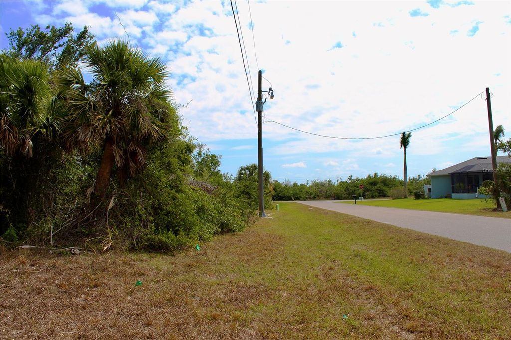 Photo of 118 Cable Drive, Rotonda West, FL 33947 (MLS # C7510515)