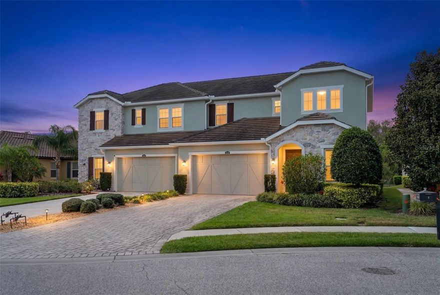 Experience the ultimate Florida lifestyle in this stunning residence located in the highly desirable Arbor Grande community of Lakewood Ranch! This spacious three-bedroom, three-bathroom home spans over 3,300 square feet, offering a perfect blend of elegance and comfort. As you step inside, you are greeted by soaring ceilings that enhance the open and airy feel of the home. The expansive floor plan seamlessly connects the living, dining, and kitchen areas, making it ideal for both daily living and entertaining.

The master suite serves as a private retreat, boasting a spa-like bathroom with a walk-in shower and dual vanities. Convenience is key with an additional bedroom on the first floor, while the second level features a large loft area complete with a wet bar—perfect for a media room or hobby space. The oversized upstairs bedroom includes a large closet and full bath, providing plenty of room for guests or family.

Outside, enjoy breathtaking sunsets from your screened-in lanai facing westward. This home sits directly across the street from the private villa-only amenities, putting relaxation right at your doorstep. Arbor Grande is a resort-style, maintenance-free community featuring a clubhouse, fitness center, two heated pools, spa, pickleball, bocce ball, and a private dog park. With an onsite manager and a very active social calendar, there is always something to do! Located in the heart of Lakewood Ranch, you are minutes away from excellent dining, shopping, and Main Street, and just a short drive to world-famous Gulf beaches. This meticulously maintained home is move-in ready and waiting for you!