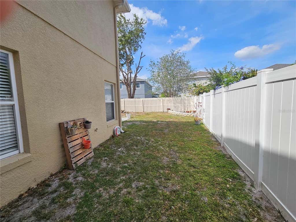 Photo of 1920 Meadow Pond Way, Orlando, FL 32824 (MLS # S5154612)