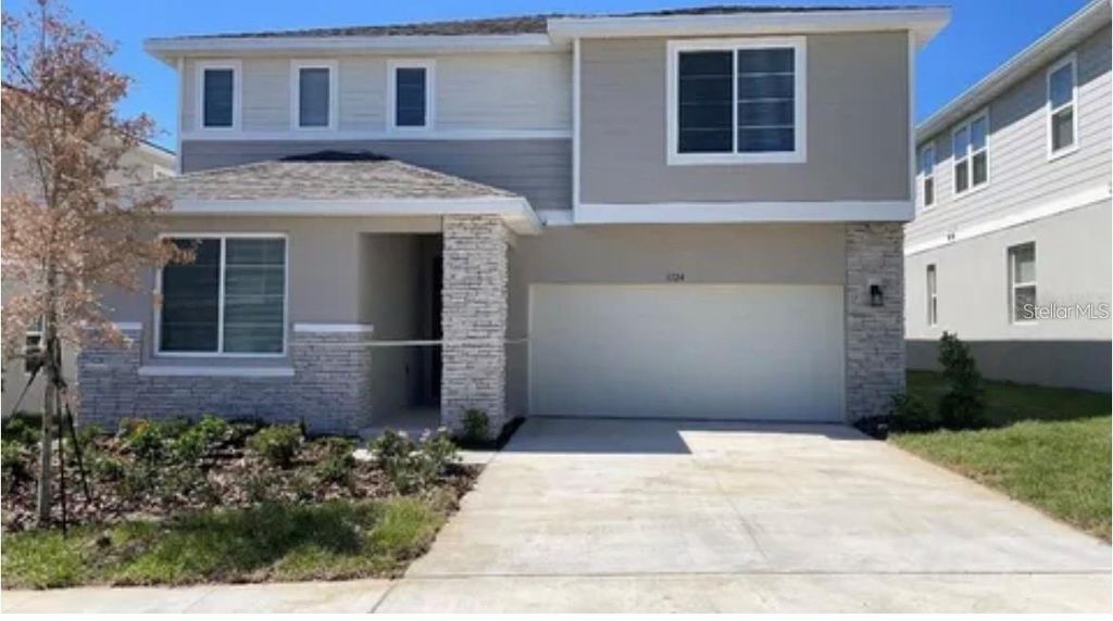 Photo of 1124 Sugarwood Street, Davenport, FL 33837 (MLS # O6390421)