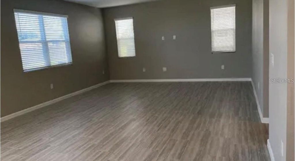 Photo of 1124 Sugarwood Street, Davenport, FL 33837 (MLS # O6390421)