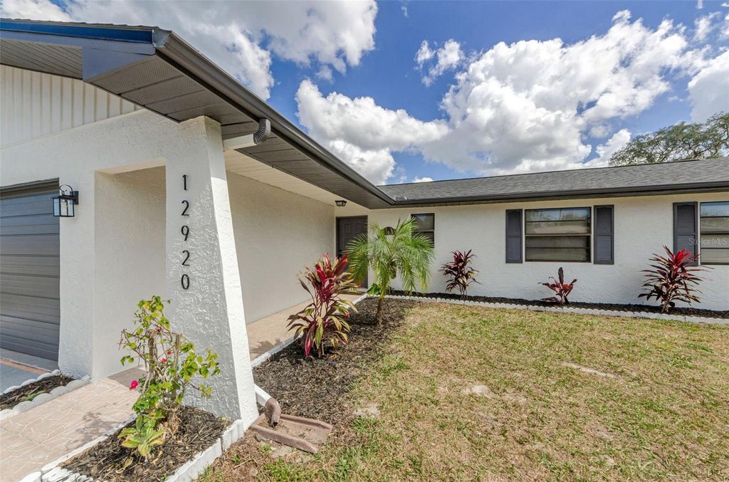 Photo of 12920 Walnut Tree Lane, Hudson, FL 34669 (MLS # TB8440796)